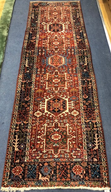 A Persian rug 260 x 68cm
